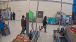 2 white men and 1 Black man leaving Walmart checkout